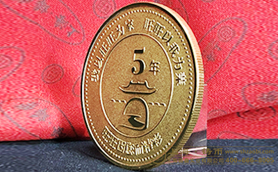 纯金的纪念币多少钱